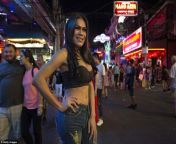 4b72d10300000578 5645755 a ladyboy stands on the busy street in thailand which is home to a 15 1524470604156.jpg from thai bond real sex