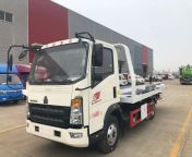 sinotruk howo 4tons flatbed tow truck 4ton 3 7t one towing two platform wrecker heavy duty truck.jpg from chines tow big cheats