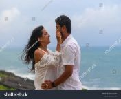 stock photo a young lovely attractive couple looking at each other embracing making love smiling cuddling 2091294208.jpg from indian honeymoon couple 1