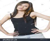 stock photo young sexy asian woman hands on hips and looking at camera 26722510.jpg from mir hebe nude
