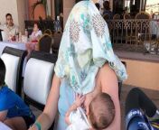 224305 breastfeeding mom cover.jpg from lacta ting mom spraying milk tram her big boods