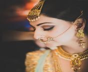 content nath designs for bridal in gold.jpg from mam axeexy figure dulhan nathni