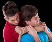 man in red shirt with arm around neck of man in blue shirt.jpg from chock neck