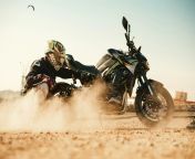 free photo of man crouching by motorbike in dust jpeg from dese hd