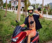 tattooed strong man tropical jungle field with red motorbike 343596 2773.jpg from arabic lovers in jungle