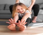 young girl stretching 23 2148570256.jpg from kids soles