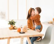 mother kissing her son 23 2148443168.jpg from son romance mom in dining table