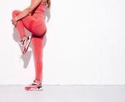 fitness smiling woman pink sports clothing young beautiful model with perfect bodyfemale posing near white wall studiocheerful happy stretching out before training 158538 21772.jpg from beautiful ass shaking and stretching