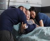 cheerful mother father hugging ill daughter sitting patient bed while treatment happy sick little girl hugged by joyful smiling parents hospital pediatrics ward 482257 47045.jpg from daughter fucking with patient
