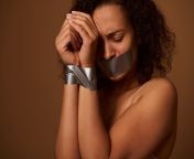 crying woman with tears her closed eyes with tied hands sealed mouth looking down with hopelessness isolated dark background with copy space concept elimination violence against women 328764 4400.jpg from kidnapped tied up