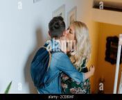 content mother gently kissing teenage son with school backpack while hugging together on steps in cozy modern house 2ce80af.jpg from step mom step son kissing sex 3gp poralia dj