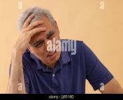close up portrait of a sad senior man crying with hand on head 2jr51rd.jpg from indian crying in pain with hindi sww raj wap desi