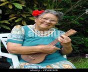 file aunty nona beamer plays a few notes on her ukulele before her class on stories and songs of old hawaii at kalani oceanside retreat in kalapana hawaii in this aug 14 2003 file photo beamer a noted authority on hawaiian culture and matriarch of the musical beamer family died early thursday she was 84 ap phototim wright file 2pa8n2e.jpg from kalani aunty