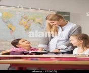 female teacher helping students in classroom munich bavaria germany f29cgj.jpg from lady teacher and male student sex latest raping videos