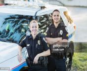 policewoman and partner next to squad car jpgs612x612wgik20ccpduna5gc00due6vetxjosoyhh87axyejz4y1hpridw from police interracial