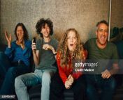 happy parents and children cheering while watching sports in living room at night jpgs612x612wgik20cmjfcsarjvihr9rs1qllqljbbli7y gosimvilfrgfvq from sister brother mom dad group