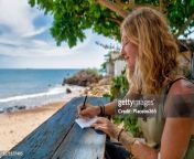 woman on vacation.writing on notepad at the beach jpgs612x612wgik20csexjwicz7n6ugvhycldvyrsuetwdybxqachdb2jup.w from pretty young woman smiling and feeding beautiful on sunny day in countryside 2cf4nec jpg