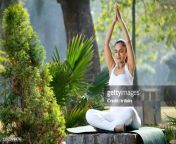 woman meditating at park jpgs612x612wgik20cnrmacsu108axq9np1cfvnbwqtwhccanne8pjaixcn2q from indian doing yoga