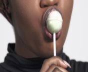 close up of a charming african american woman with a lollipop in her mouth jpgs640x640k20cof3xbibwnp ah6qajf3gzj9sibnn70xq5xvq2m5kwq4 from black women licking