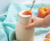 toddler reaching for banana peach smoothie 500x500.jpg from banana peach smoothie