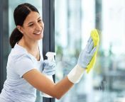pngtree smiling domestic worker cleans window enjoys chores in apartment photo image 47664570.jpg from देसी नौकरानी के साथ मज़