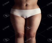 23404941 slim body of young indian woman in beautiful white panties in front of black background.jpg from search photos inadina undaerwaer