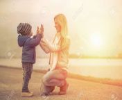 41066821 happiness mother and son under sun light.jpg from mom sun