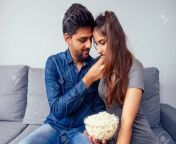 132838690 portrait of romantic positive indian couple in apartment living room having plate of chips snack.jpg from desi couple romance at room mp4