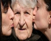 75841230 young girl and adult woman kissing grandmother on cheeks granny smiling and looking to the camera.jpg from granny kiss