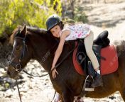 39523733 sweet beautiful young girl 7 or 8 years old riding pony horse hugging and smiling happy wearing.jpg from beautiful riding 7