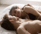 114276159 sensual couple lying in bed together hugging after talking and smiling satisfied girlfriend and.jpg from boyfriend after sex romance with girlfriend