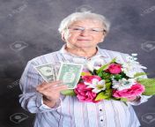 92951088 gray hairy elderly woman with flowers and money.jpg from hairy old wife