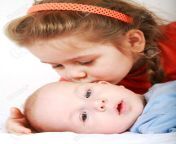 7521615 cute older sister giving a kiss to her brother.jpg from cute sister gives brother