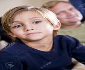 6865211 face of cute 5 year old little boy with father watching in background.jpg from little 5y o