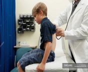 focused 169044432 stock photo doctor examining young boy.jpg from dr does exam