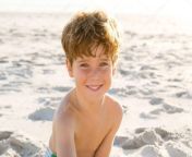 depositphotos 103862690 stock photo cute little boy at beach.jpg from littleboy yong