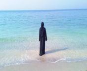 depositphotos 354539756 stock video muslim woman wearing hijab walking.jpg from muslim beaches videos