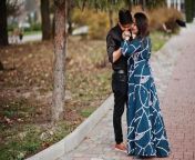 love story of indian couple posed outdoor man kiss her hand photo.jpg from indian lover kissing outdoor