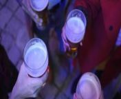 four friends together drink beer on a night street multiracial people free video.jpg from bar real vide
