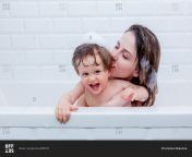 offset 820109.jpg from mother and son in bath tub