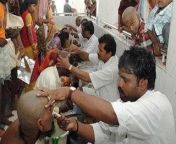people in kalyanakatta removing their hair.jpg from tirupati tample long hair cut