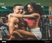 muscular woman and man in gymsportive life fitness gym hot curly woman handsome bodybuilder sportive couple in gym 2a32gkp.jpg from 231007　bodybuilder　woman