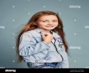 fashion beautiful girl posing on blue background school models portrait of a girl bright emotions beautiful hair and clothes teenage girl wind in 2a742dy.jpg from schoolmodels com custom