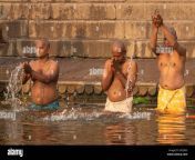 varanasi india january 18 2019 a group of devots is bathing at sunrise along the varanasi ghats traditional hindu ritual 2atj5n3.jpg from 18 indian bathing without no dress
