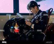 kyoto japan november 7th 2018 a high school girl in her school uniform reading on a bus in kyoto japan 2aph06b.jpg from বাংলাxxxvideo com japan school girl vid