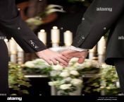 religion death and dolor couple at funeral holding hands consoling each other in view of the loss 2bpex14.jpg from rajasthani xxx com bpex chim d