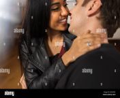 young multiethnic couple kissing at home she is indian black and he is caucasian 2eayxec.jpg from desi couple kissing and lady recording with horniest expressions