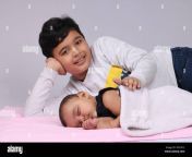 young indian brother comforting his sister while she is asleep 2d51612.jpg from sleeping indian sister brother se