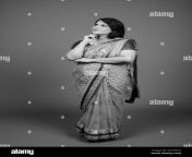 mature indian woman wearing sari indian traditional clothes 2d7h3c0.jpg from mature tamil wife wearing saree
