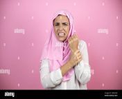 young beautiful arab woman wearing islamic hijab over isolated pink background suffering pain on hands and fingers arthritis inflammation 2d9cr9d.jpg from beautiful arab in pain while getting fucked in ass by lover mp4 randi download file